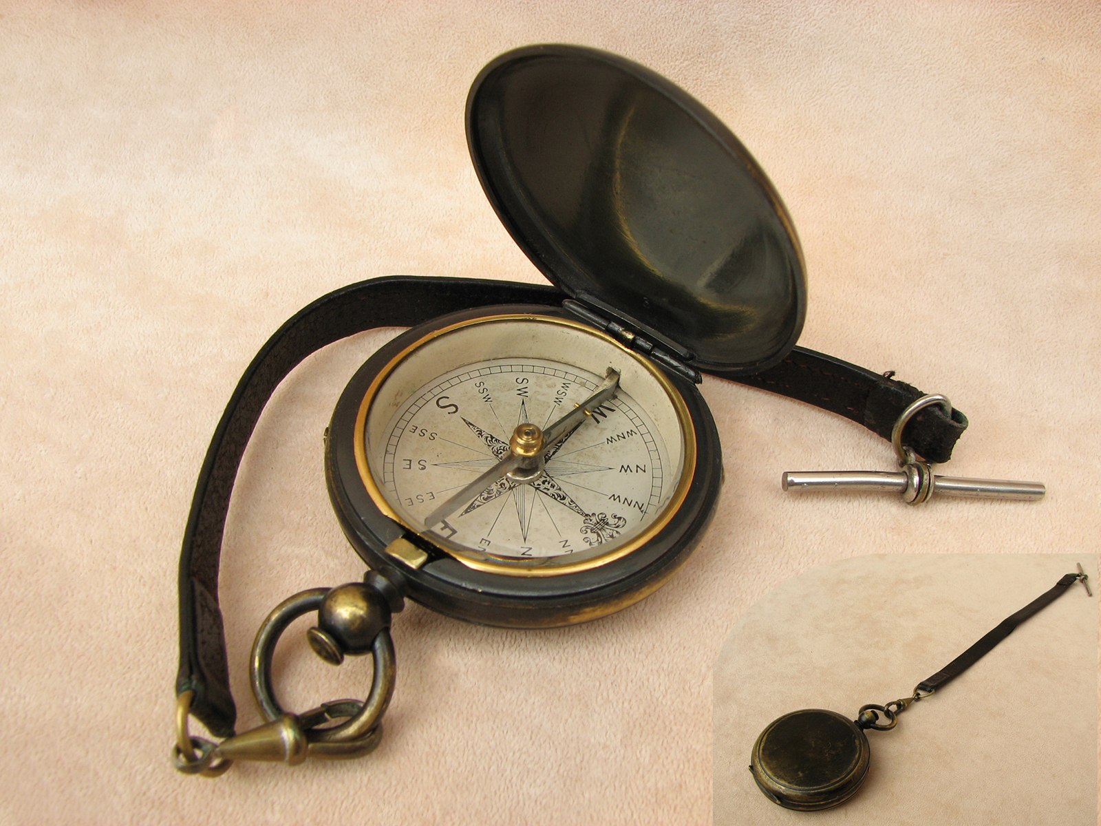 19th Century blackened brass pocket compass with T bar leather strap